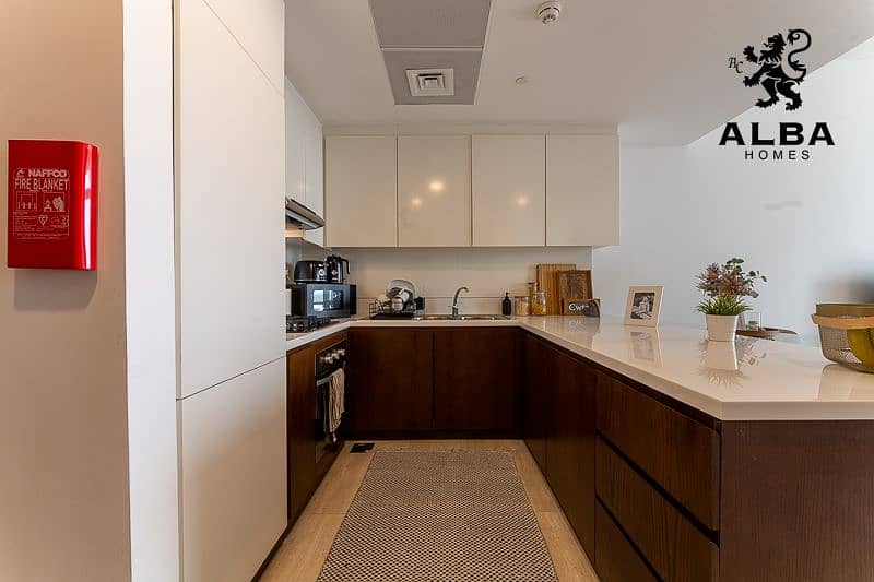 8 FURNISHED 1BR APARTMENT FOR SALE IN JUMEIRAH VILLAGE CIRCLE (5). jpg