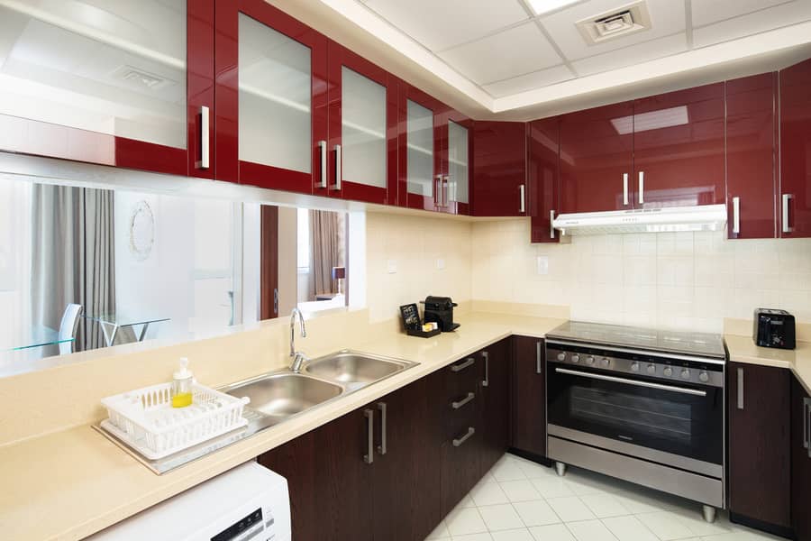 21 One Bedroom Deluxe - Kitchen ARea. jpg
