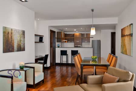 شقة فندقية 2 غرفة نوم للايجار في الصفوح، دبي - Premier Two Bedroom Sea View Apartment_Dining and Kitchen View. jpg