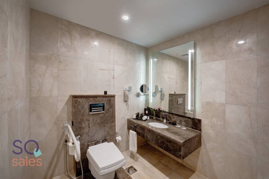8 Ghaya Grand Hotel Dubai  - One Bedroom Bathroom 7. jpg
