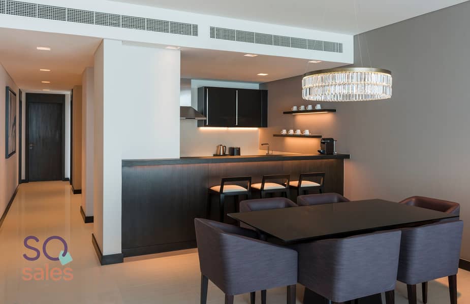 2 Sheraton Grand Hotel, Dubai - 3 Bedroom Apartment Kitchen & Dining Area - Copy. jpg