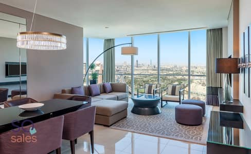 1 Bedroom Hotel Apartment for Rent in Sheikh Zayed Road, Dubai - Sheraton Grand Hotel, Dubai - 3 Bed Apartment - Living Room City View - Copy. jpg