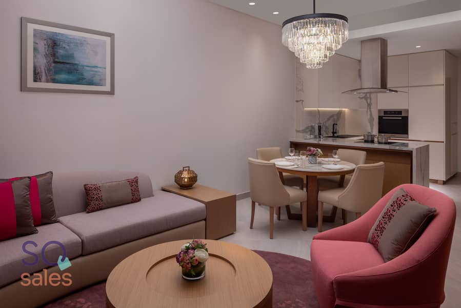 2 One Bedroom Apartment City View Living Room JOCH_011_051223. jpg