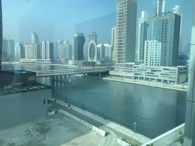FURNISHED | CORNER UNIT | PARTIAL CANAL VIEW