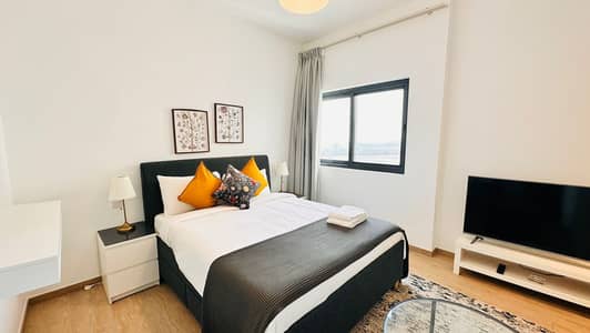 Studio for Rent in Wasl Gate, Dubai - Elegant and Cozy Studio | Fully Furnished | Free DEWA/WiFi