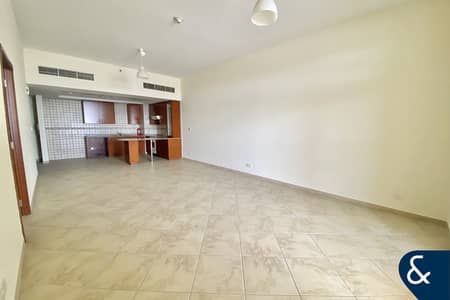 1 Bedroom Apartment for Rent in Motor City, Dubai - Large Balcony | High Floor | Unfurnished