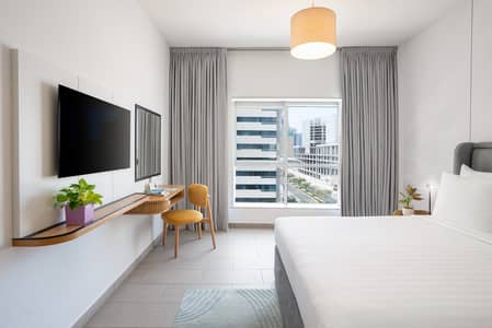 1 Bedroom Hotel Apartment for Rent in Barsha Heights (Tecom), Dubai - Premier 1BR -Bedroom 1. jpg