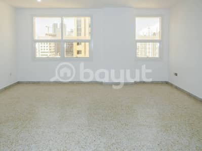 2 Bedroom Flat for Rent in Tourist Club Area (TCA), Abu Dhabi - Hot Deal! Only 55K Yearly! Elegant 2-BHK Chiller Free  Flat with Wardrobes on Hamdan St.