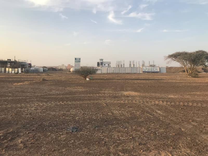 no commission , own land in al manama area 24 months instalment