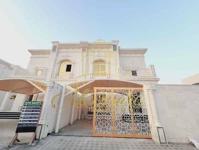 5 Bedroom Villa for Rent in Hoshi, Sharjah - CvqwhfY8ACMADDFJQ2eia7TuZKcTBzhW6ohCT7fe