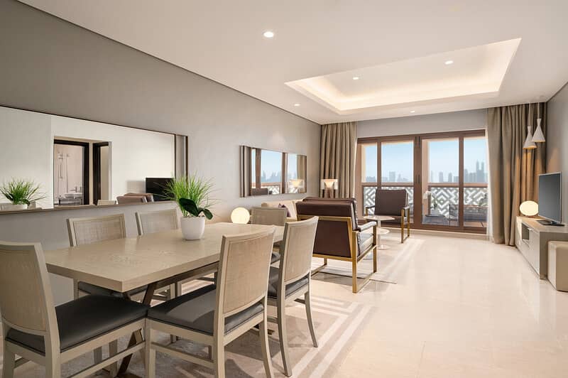 3 Family Three Bedroom Palm View Apartment - Living Room. jpg