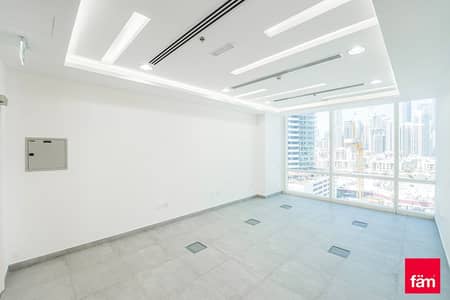 Office for Sale in Business Bay, Dubai - 2 car park fitted office on mid floor