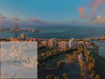 2 Cпальни Апартамент Продажа в Аль Хамра Вилладж, Рас-эль-Хайма - Ellington Views  - aearial view -sunset. jpg