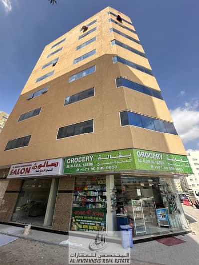 11 Bedroom Building for Sale in Bu Tina, Sharjah - For sale, a new building in Al Butina area, Sharjah It is rented and has an annual income of 750 thousand dirhams The building consists of ground + 7 floors It has 42 apartments + 3 shops