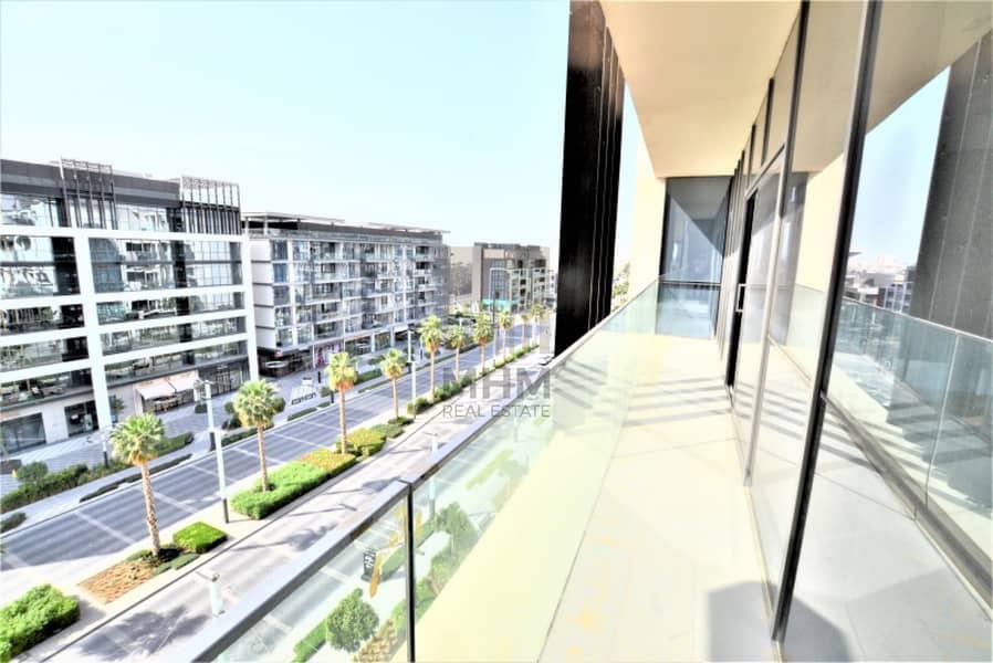 Full Boulevard View | Rooftop Pool | 2 BR + Maid | Vacant