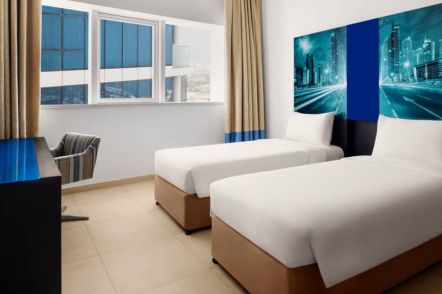 4 Two Bedroom Apartment_Twin Bedroom . JPG