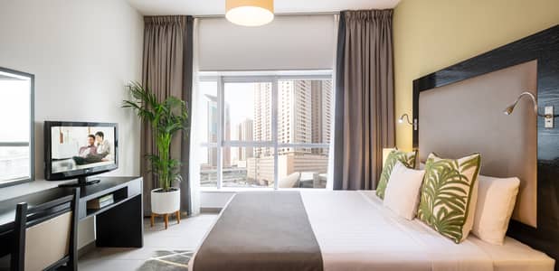 1 Bedroom Hotel Apartment for Rent in Barsha Heights (Tecom), Dubai - One BR Premier Master Bedroom. jpg