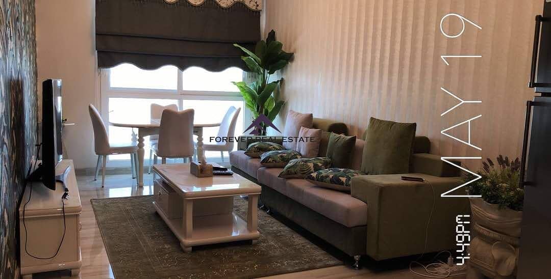 DISTRESS DEAL -  Spacious and Upgraded  Fully Furnished 2 BHK  Apartment for sale in QUEUE POINT just   AED 725