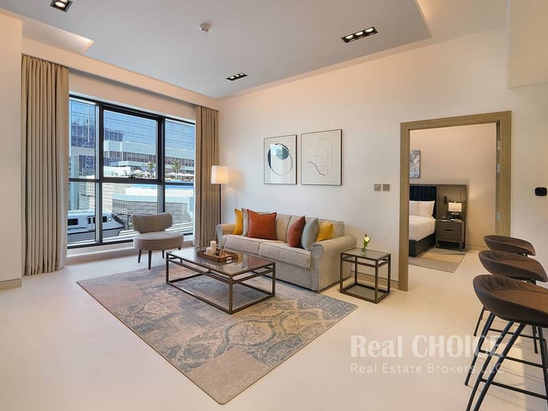 3 CMTP-One-Bedroom-Type-B-Living-room-view-monorail. jpg