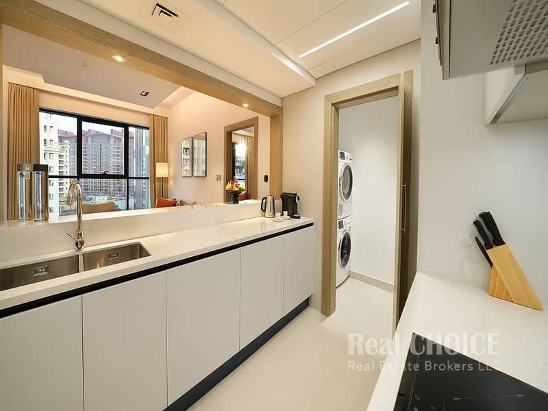 6 CMTP-One-Bedroom-Type-B-Kitchen-utility-area. jpg