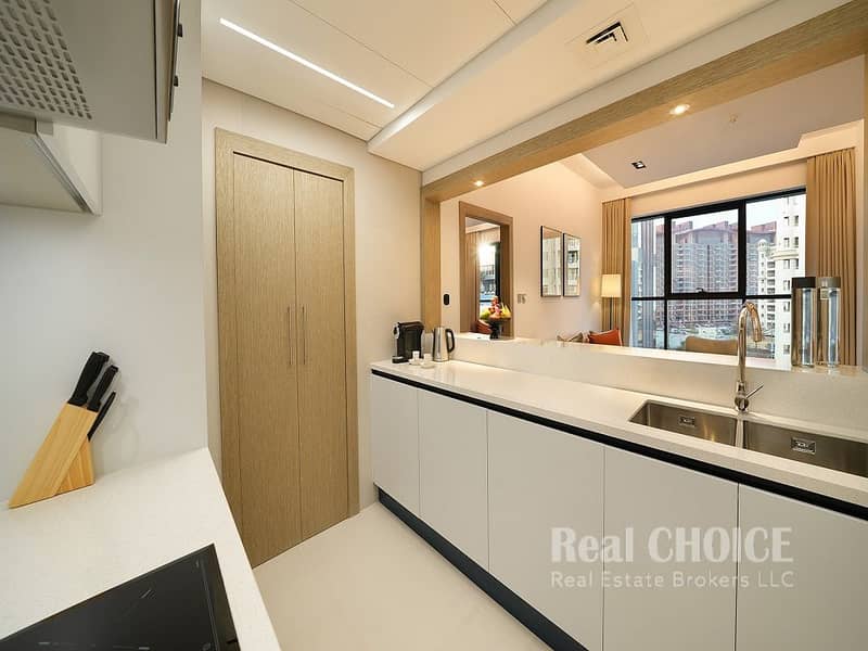 7 CMTP-One-Bedroom-Type-B-Kitchen-open-plan. jpg