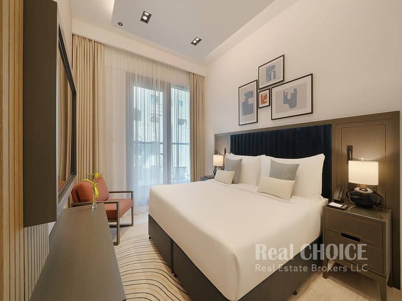 8 CMTP_Deluxe_One_Bedroom_Bedroom. jpg