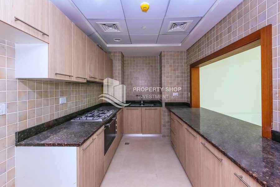 9 2-bedroom-apartment-abu-dhabi-yas-island-ansam-tower-3-kitchen. JPG