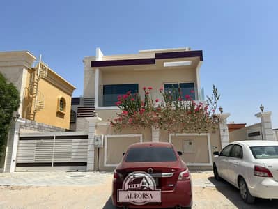 For rent, a villa in Al Rawda 1, Ajman, 6 rooms, 8 bathrooms, a sitting room, central air conditioning, and a hall. Distinctive design and excellent l