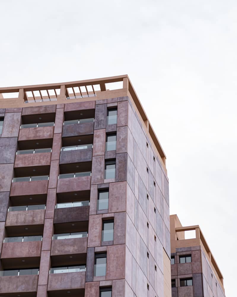 2 architectural-apartment-building-city-with-copy-space. jpg