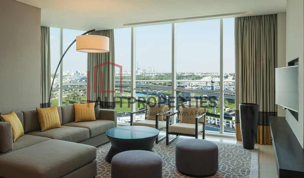 2 Sheraton Grand Hotel, Dubai - 3 Bedroom Apartment Living Room. jpg