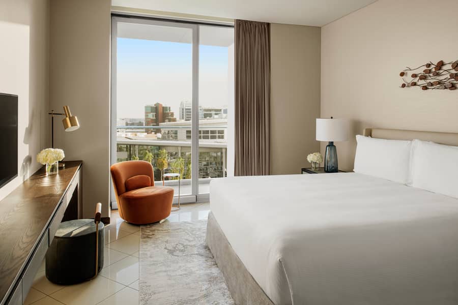 6 Two Bedroom Residence Suite with Creek and Urban View - Master Bedroom. JPG