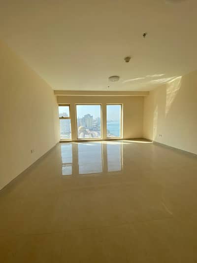 3 rooms and a hall for annual rent in Sharjah, a new building on the Corniche with a charming view, with two months free