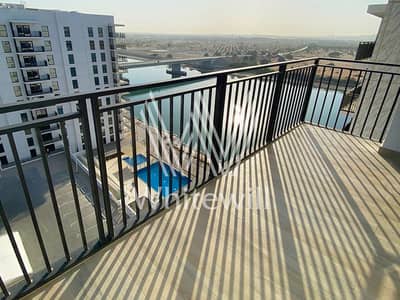 2 Bedroom Apartment for Sale in Yas Island, Abu Dhabi - Balcony with Canal View. jpg