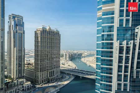 Studio for Sale in Business Bay, Dubai - Canal View | High Floor | Fully Furnished