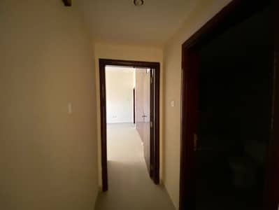 Three rooms and a hall in Al Qasimia area with 3 bathrooms and a balcony and wonderful finishing