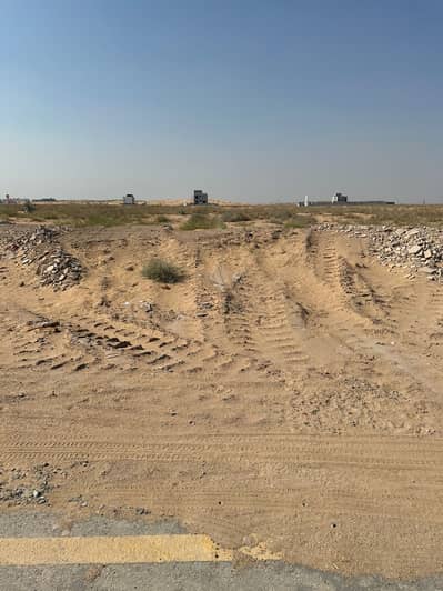 For sale residential land in Sharjah in the Rawdat Al Qart area, opposite Al Suyuh 16 and New Khor Fakkan Street