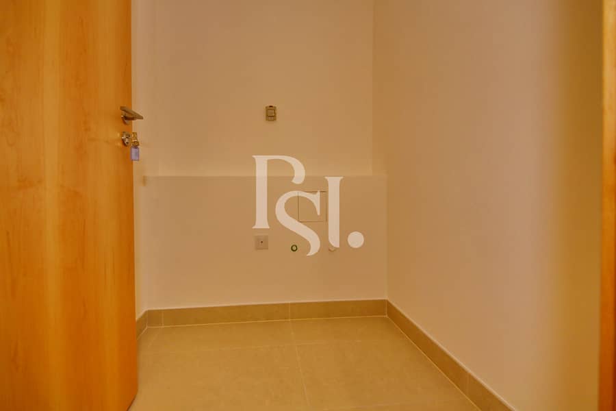 5 1-br-apartment-abu-dhabi-al-raha-beach-al-zeina-tower-a-laundry-area. jpg