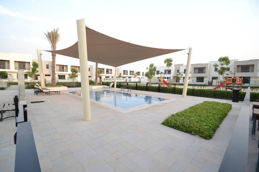 26 4  Bedroom + Maids Very Close to Pool and Park ( Corner Unit )