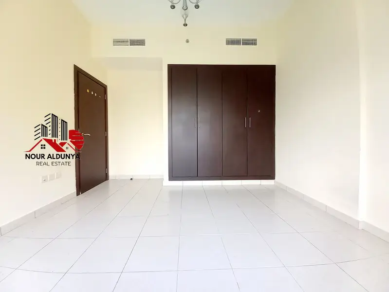 MONTHLY PAYMENTS ( 12 CHEQUES ) - SPACIOUS 1BHK WITH BIG BALCONY - RENT 56K - OPEN VIEW - KID'S PLAY AREA + GYM + SWIMMING POOL + CAR PARKING FREE