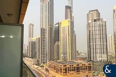 Studio for Sale in Business Bay, Dubai - Burj Views | Guaranteed ROI | Below OP