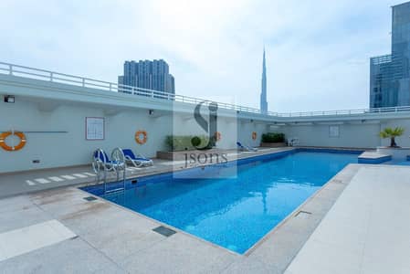 2 Bedroom Flat for Rent in Sheikh Zayed Road, Dubai - AWR Properties 21st Century Apt. 2505 Swimming Pool. jpg