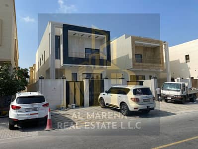 For sale, a dream villa in Al Rawda 3 area in Ajman # Two floors and a roof, free ownership for all nationalities, without a down payment. 100% ban