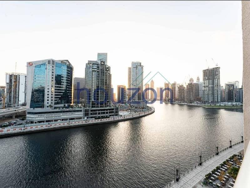 Fully Furnished 1BR | Canal + Pool View | Vacant