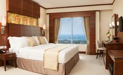 谢赫-扎耶德路， 迪拜 1 卧室酒店式公寓待租 - Premium One Bedroom Suite Bedroom Day. jpg