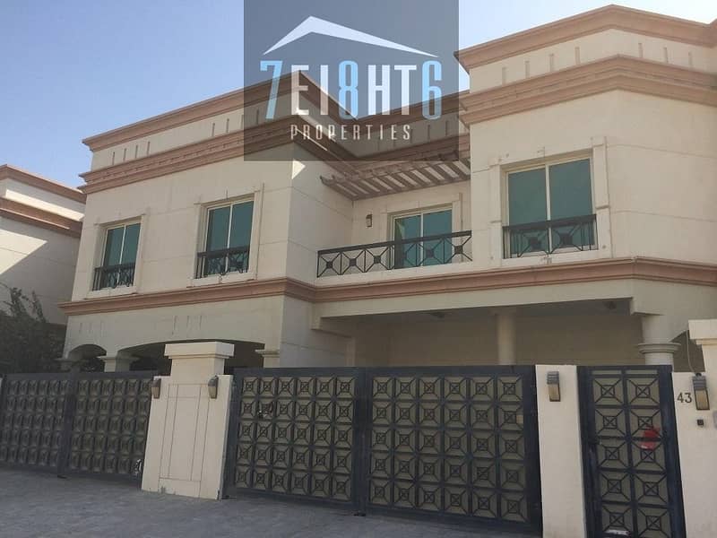 Excellent facilities: 4 b/r villa + maids room + communal gardens + s/pool + gym + sauna + jacuzzi for rent in Barsha 1