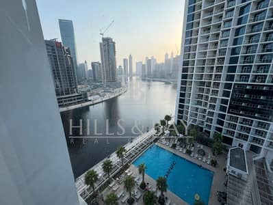 Studio for Rent in Business Bay, Dubai - WITH BALCONY |STUNNING POOL & CANAL VIEW