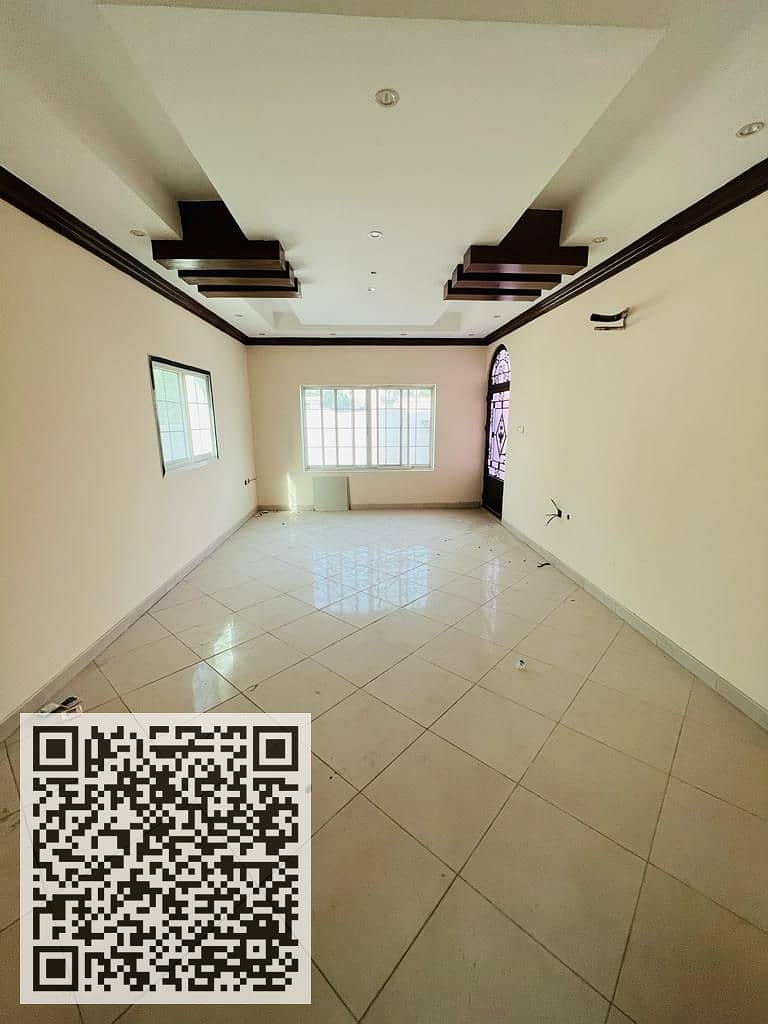 Villa for sale in Ajman, a corner on two streets, a large area