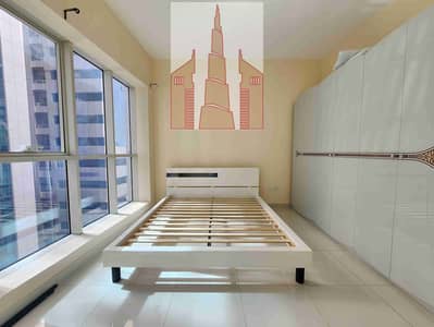Spacious 2-BR with Balcony | Prime Location | Furnished |