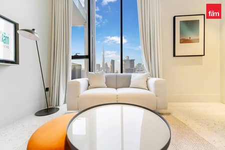 Studio for Rent in Business Bay, Dubai - Work And Unwind | Burj-Facing Studio | Full Amenities