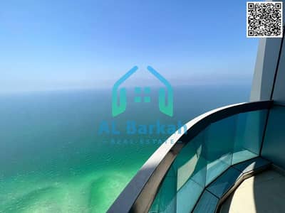## For Sale: Two-Bedroom Apartment with Two Living Rooms, Maid's Room, and Large Kitchen with Sea View in Corniche Tower, Ajman. ##